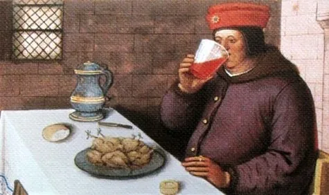 A nobleman enjoying a drink of red wine.